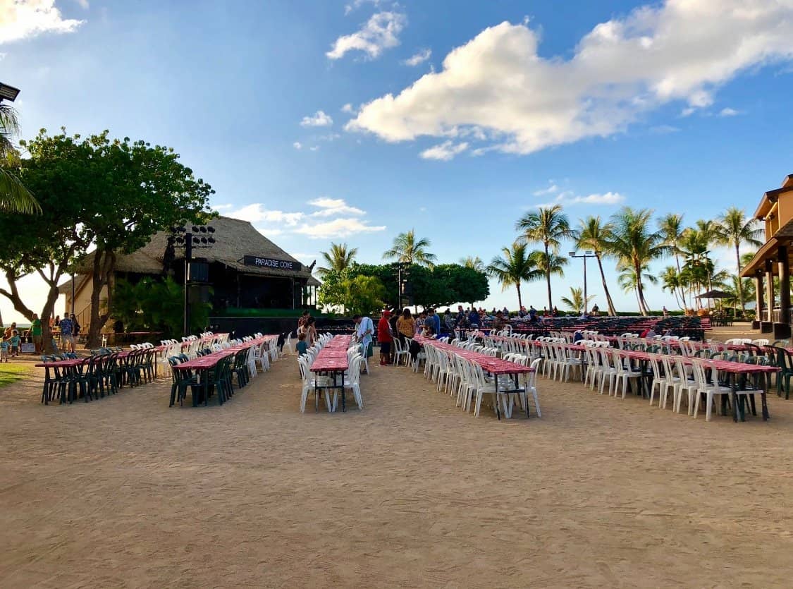 Seats and tables at Paradise Cove Luau in O'ahu, Hawaii