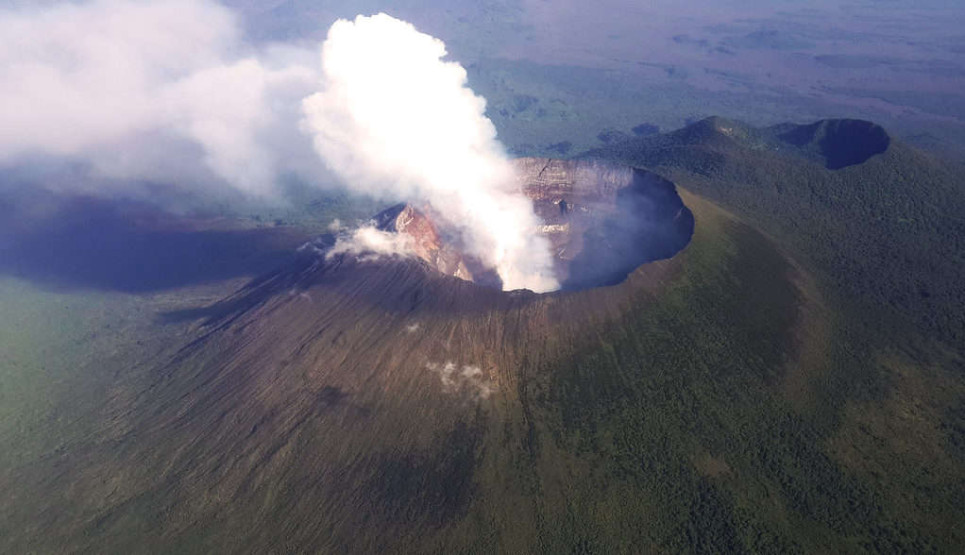 An aerial view of the towering volcanic peak of Mt. Nyiragongo.